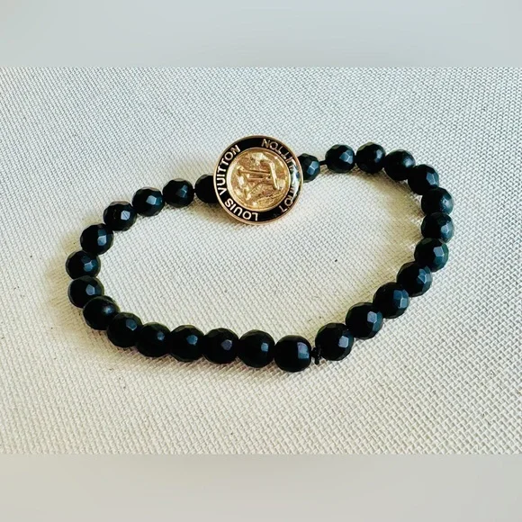LOUIS VUITTON Black Beaded Bracelet with Gold LV Medallion - Picture 3 of 3